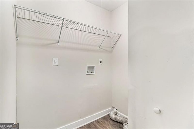 clothes washing area with laundry area, washer hookup, wood finished floors, baseboards, and electric dryer hookup