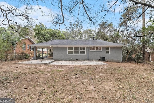 back of property featuring crawl space, a patio area, central air condition unit, and fence