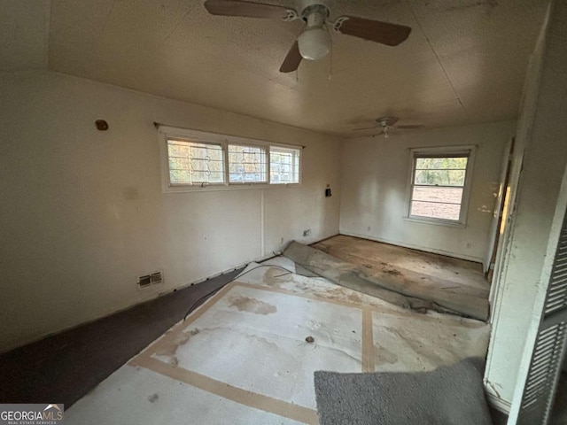 3195 Benjamin E Mays Dr SW, Atlanta, GA 30311 - empty room with plenty of natural light and ceiling fan