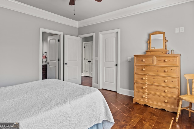 bedroom featuring ornamental molding, dark wood-style flooring, ceiling fan, and baseboards