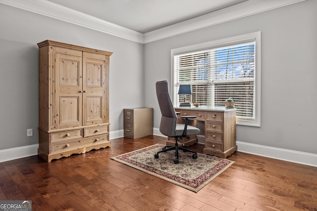 office area featuring crown molding, baseboards, and wood finished floors