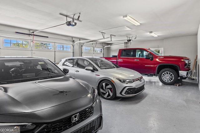 garage featuring a garage door opener