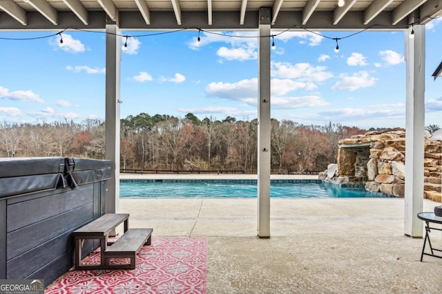 outdoor pool with a patio