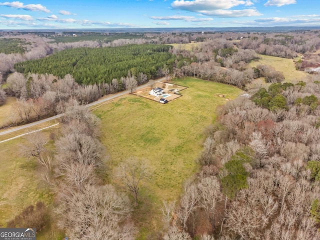 aerial view featuring a forest view