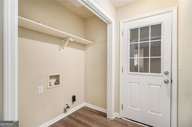 laundry room featuring laundry area, baseboards, washer hookup, and dark wood-type flooring