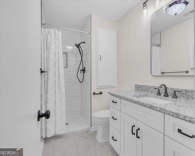 bathroom featuring marble finish floor, visible vents, toilet, vanity, and tiled shower