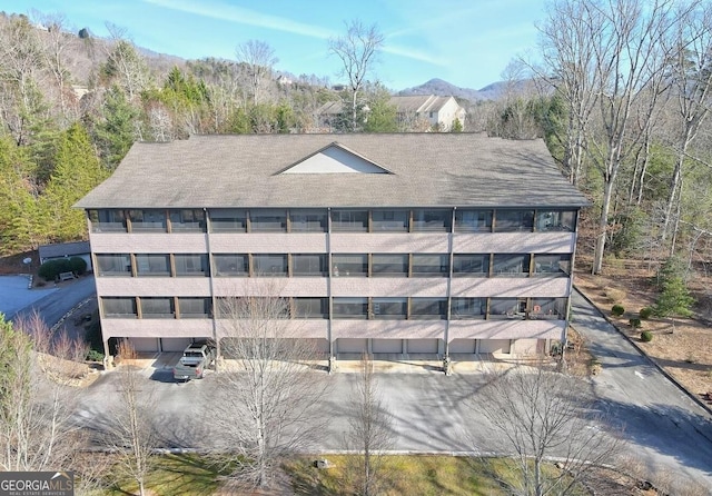 exterior space featuring a mountain view