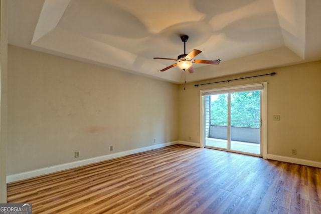 116 Smoky Mountain Ln Unit 103, Clayton, GA 30525 - empty room featuring a raised ceiling, wood finished floors, and ceiling fan