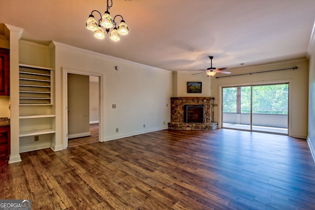116 Smoky Mountain Ln Unit 103, Clayton, GA 30525 - unfurnished living room with a ceiling fan, ornamental molding, a stone fireplace, dark wood-style flooring, and built in shelves
