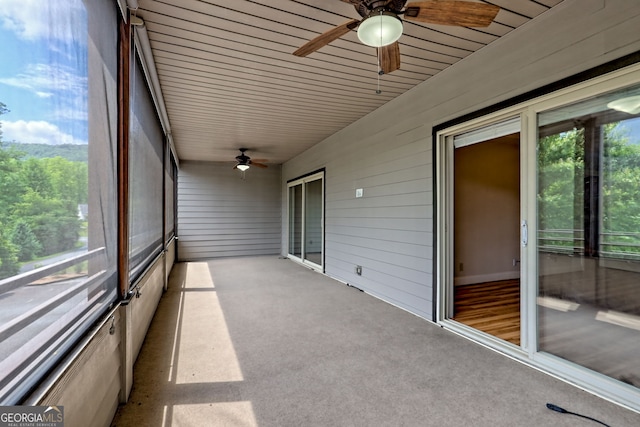116 Smoky Mountain Ln Unit 103, Clayton, GA 30525 - unfurnished sunroom featuring a ceiling fan