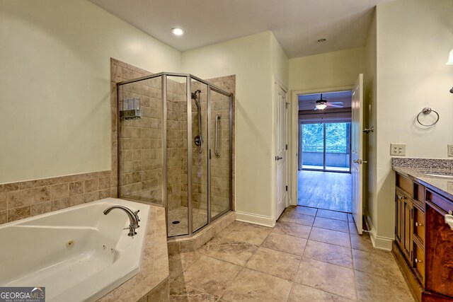116 Smoky Mountain Ln Unit 103, Clayton, GA 30525 - bathroom featuring a shower stall, a whirlpool tub, vanity, tile patterned floors, and recessed lighting