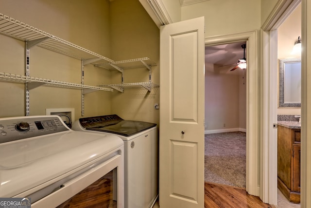 116 Smoky Mountain Ln Unit 103, Clayton, GA 30525 - laundry room featuring washing machine and clothes dryer, a ceiling fan, and light wood finished floors