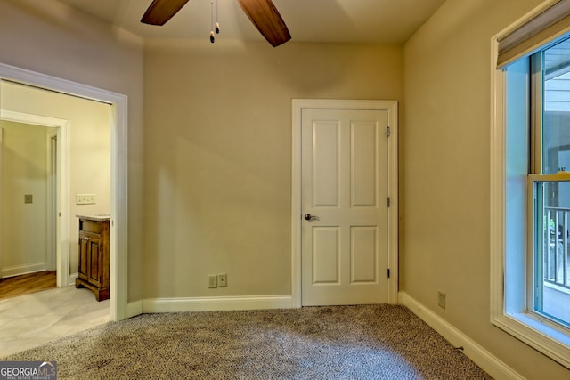 116 Smoky Mountain Ln Unit 103, Clayton, GA 30525 - unfurnished bedroom featuring light colored carpet and ceiling fan