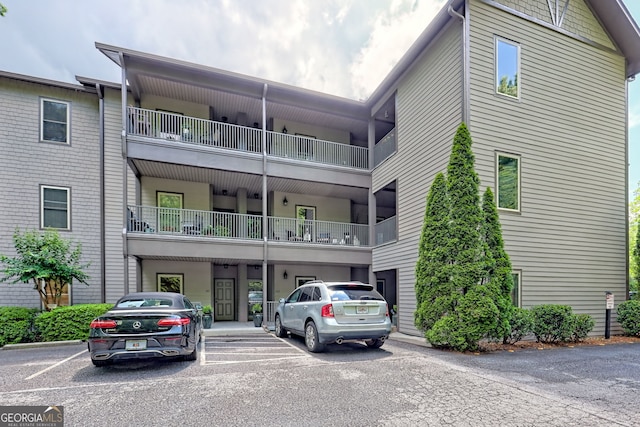 116 Smoky Mountain Ln Unit 103, Clayton, GA 30525 - view of property featuring uncovered parking