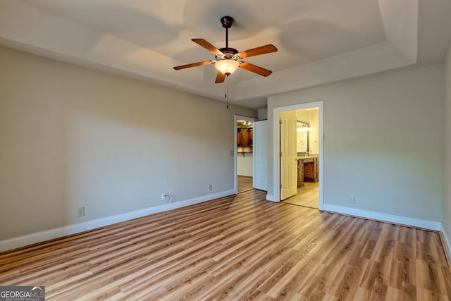 116 Smoky Mountain Ln Unit 103, Clayton, GA 30525 - unfurnished bedroom with light wood-type flooring, ensuite bathroom, and a ceiling fan