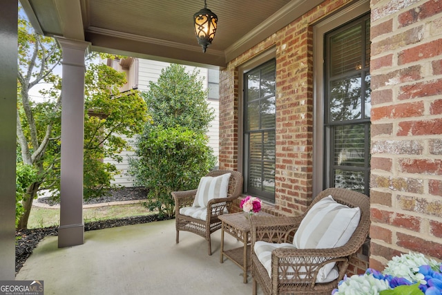 view of patio featuring a porch