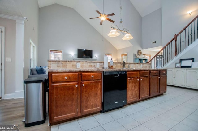 kitchen with a sink, black dishwasher, open floor plan, and a ceiling fan