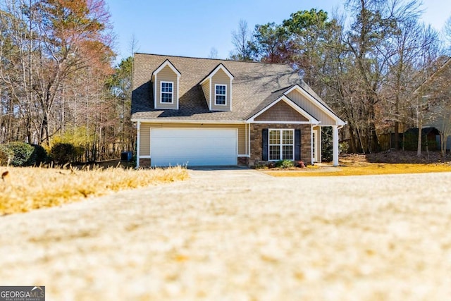 view of front of home with a garage, stone siding, central AC, and driveway