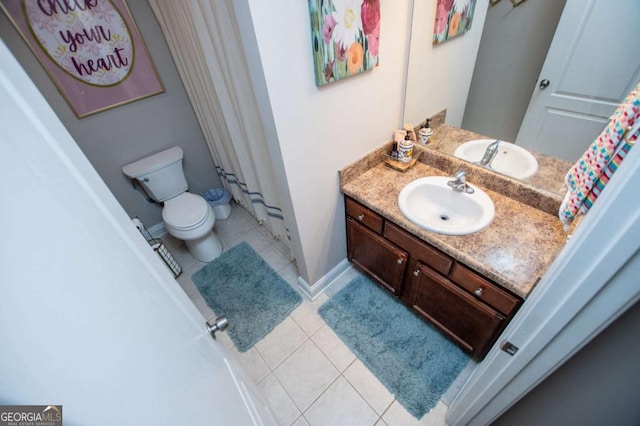 full bathroom featuring baseboards, toilet, tile patterned floors, curtained shower, and vanity