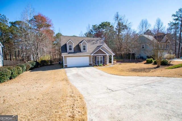 view of front facade featuring a garage and concrete driveway