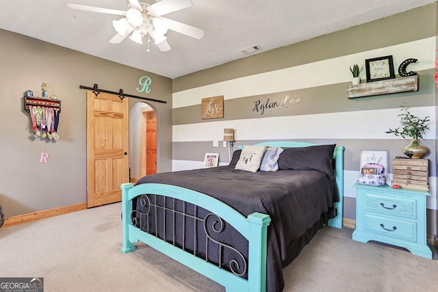 carpeted bedroom featuring arched walkways, visible vents, ceiling fan, and baseboards