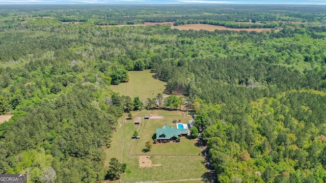 drone / aerial view with a view of trees