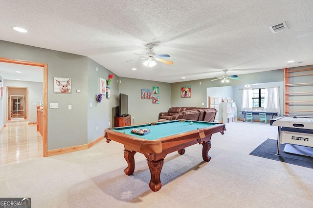 game room with light carpet, visible vents, a textured ceiling, and pool table