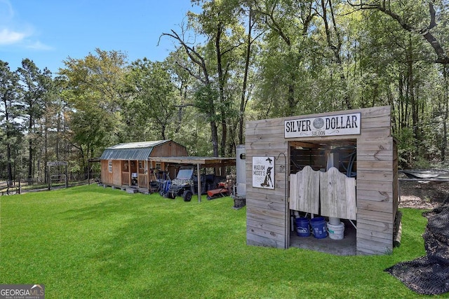 exterior space featuring an outbuilding and a carport