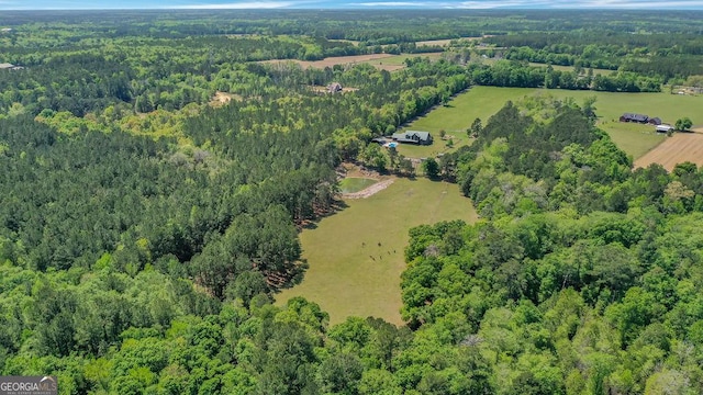 drone / aerial view with a forest view