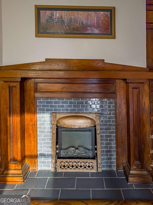 room details with a tile fireplace