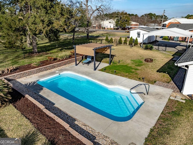 view of swimming pool with a patio area, a fenced backyard, a fenced in pool, and a lawn