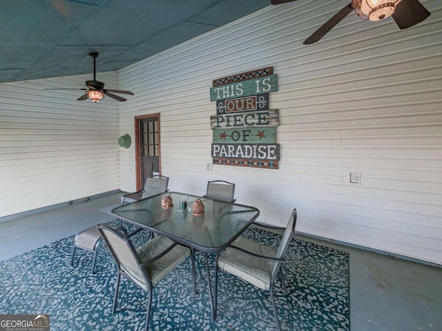 exterior space featuring outdoor dining area and ceiling fan