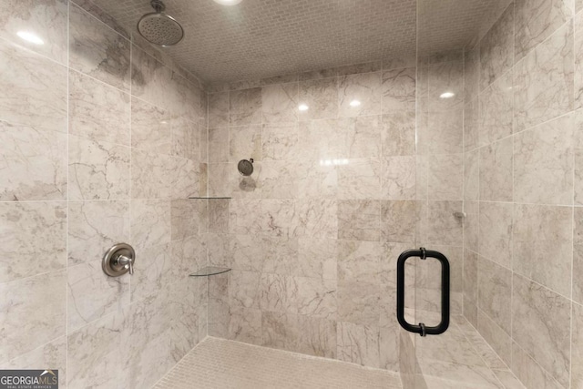 bathroom with a shower stall