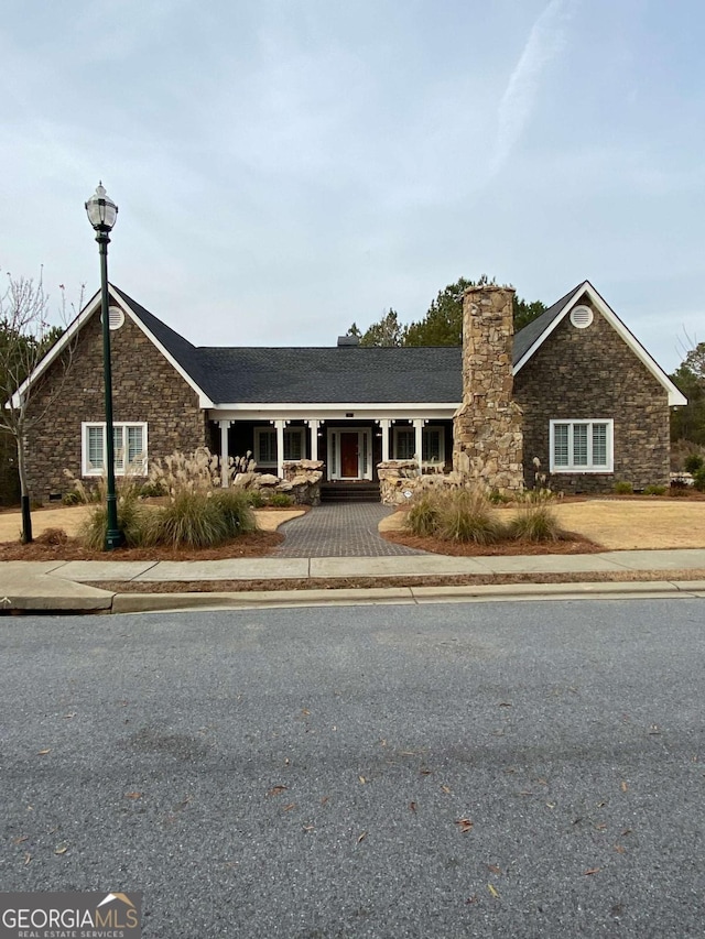 view of front of home with a chimney