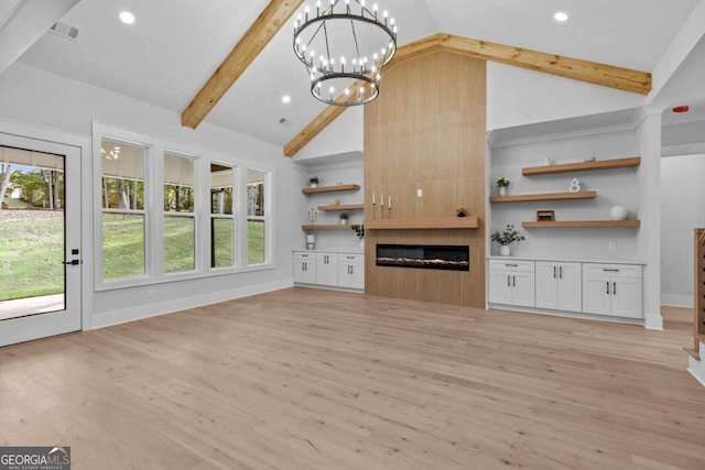 unfurnished living room featuring high vaulted ceiling, a large fireplace, visible vents, light wood-style floors, and beamed ceiling