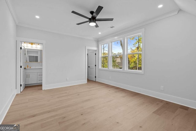 unfurnished bedroom featuring light wood finished floors, baseboards, ornamental molding, and recessed lighting