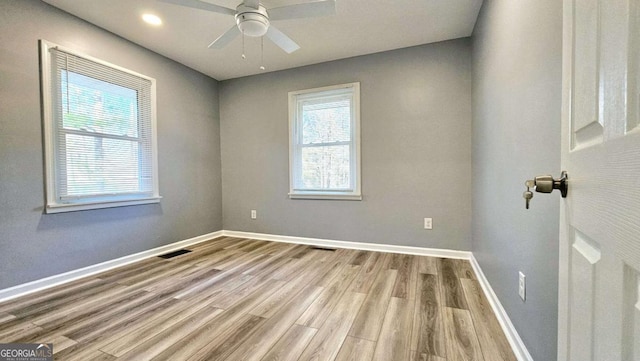 730 Keys Ferry Rd, Jackson, GA 30233 - empty room with wood finished floors, a ceiling fan, and recessed lighting