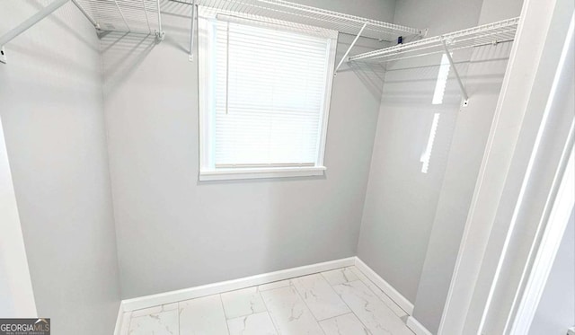 730 Keys Ferry Rd, Jackson, GA 30233 - walk in closet featuring marble look tiles