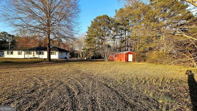 730 Keys Ferry Rd, Jackson, GA 30233 - view of grassy yard featuring a shed