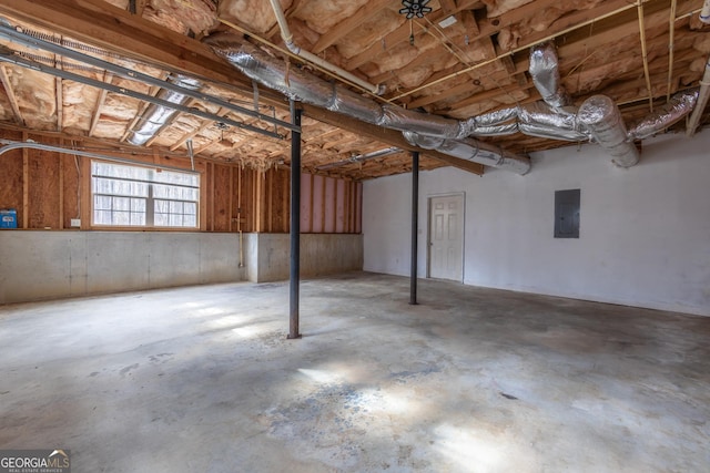 basement featuring electric panel