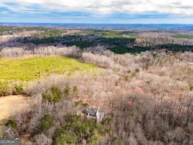 drone / aerial view with a forest view