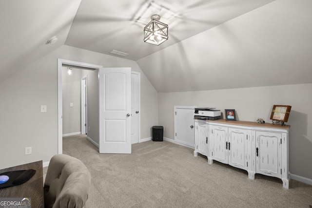 bonus room with lofted ceiling, visible vents, light carpet, and baseboards