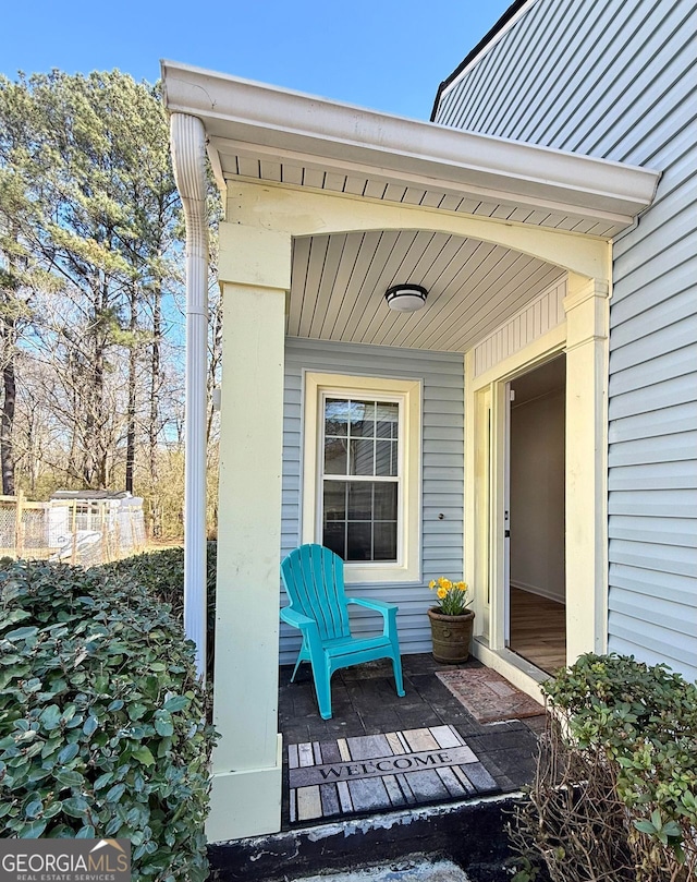 entrance to property with covered porch