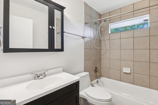 full bathroom featuring shower / washtub combination, vanity, and toilet