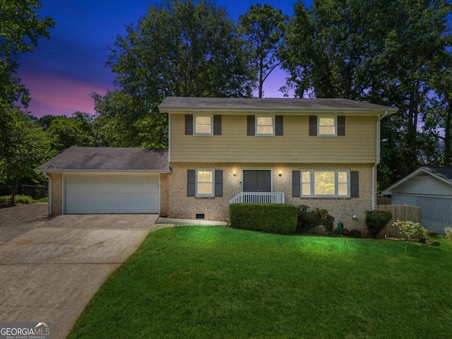 colonial house featuring a garage, brick siding, driveway, crawl space, and a front lawn