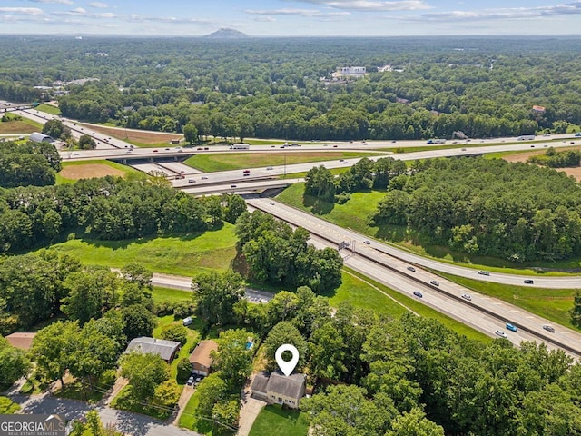 aerial view featuring a forest view