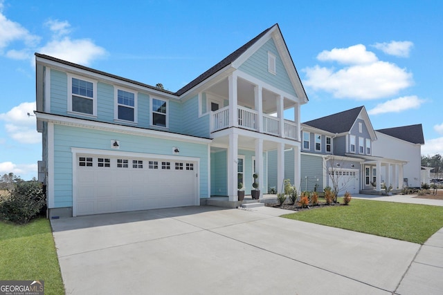 view of front facade featuring concrete driveway, a front lawn, an attached garage, and a balcony