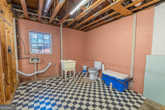 below grade area with tile patterned floors