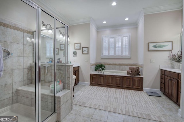 bathroom featuring a garden tub, ornamental molding, vanity, a shower stall, and tile patterned flooring