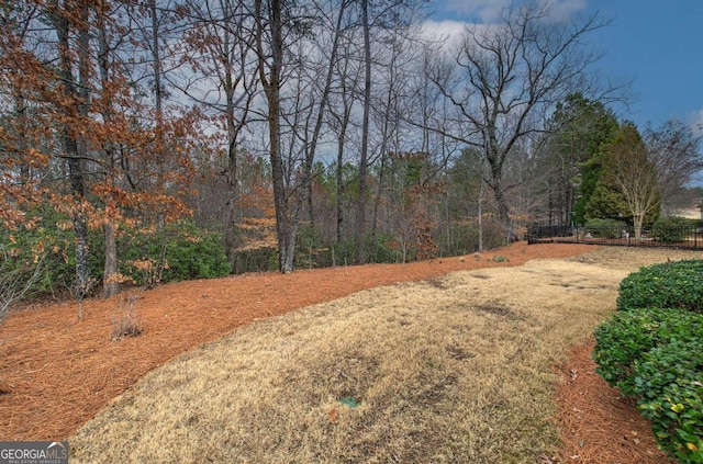 view of yard with fence